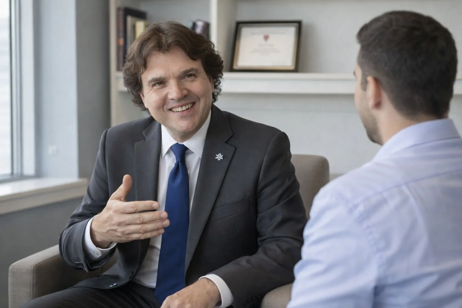 rick-saruna-smoking-cessation-explaining-program-windsor Body & Mind counselling Windsor Ontario therapist Rick Saruna helping client